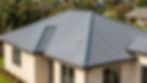 Gray metal roof installed by an Austin roofing contractor.