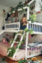 a boy shows off her cool bedroom during a film session with Moon Bloom Photo
