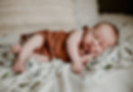 a newborn baby sleeps peacefully