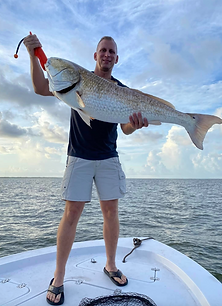 Captian Brennan Giles showing off fresh catch.