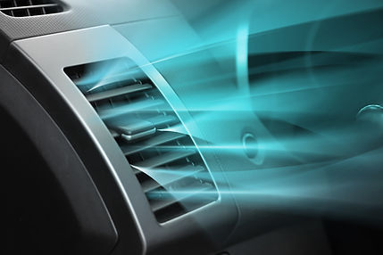 Switched on conditioner with flow of cold air in car.jpg