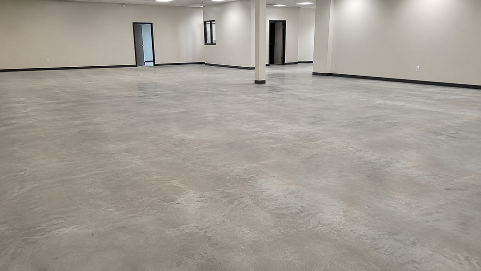 Clean concrete slab ready for new flooring after VCT and mastic removal
