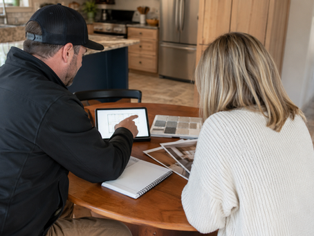Homeowner reviewing tile removal contractor documentation before a Central Oregon job