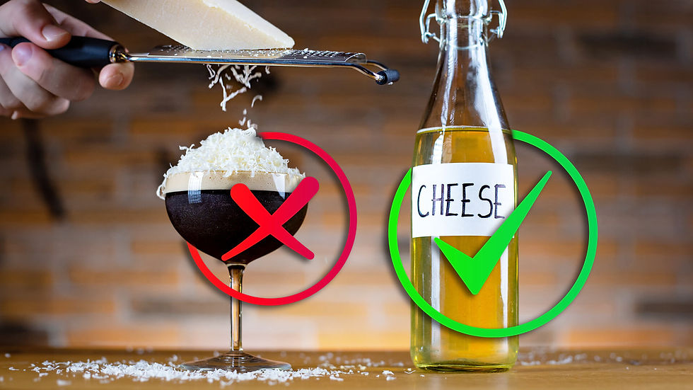 Espresso Martini with parmesan cheese on top, besides a bottle of homemade cheese liqueur