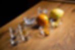 A table with ingredients needed to create sparkling dry vermouth