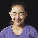 Face photo of smiling youth, Faces Tell Stories