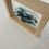 Thumbnail: wave in natural wood frame