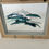 Thumbnail: wave in grey frame