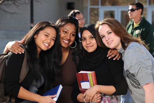108475978_teens in front of school.jpeg