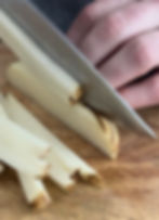 cutting a potato into fries