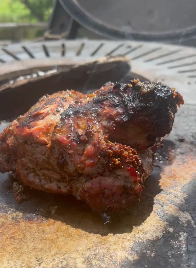 smoked pork loin being seared on the plancha