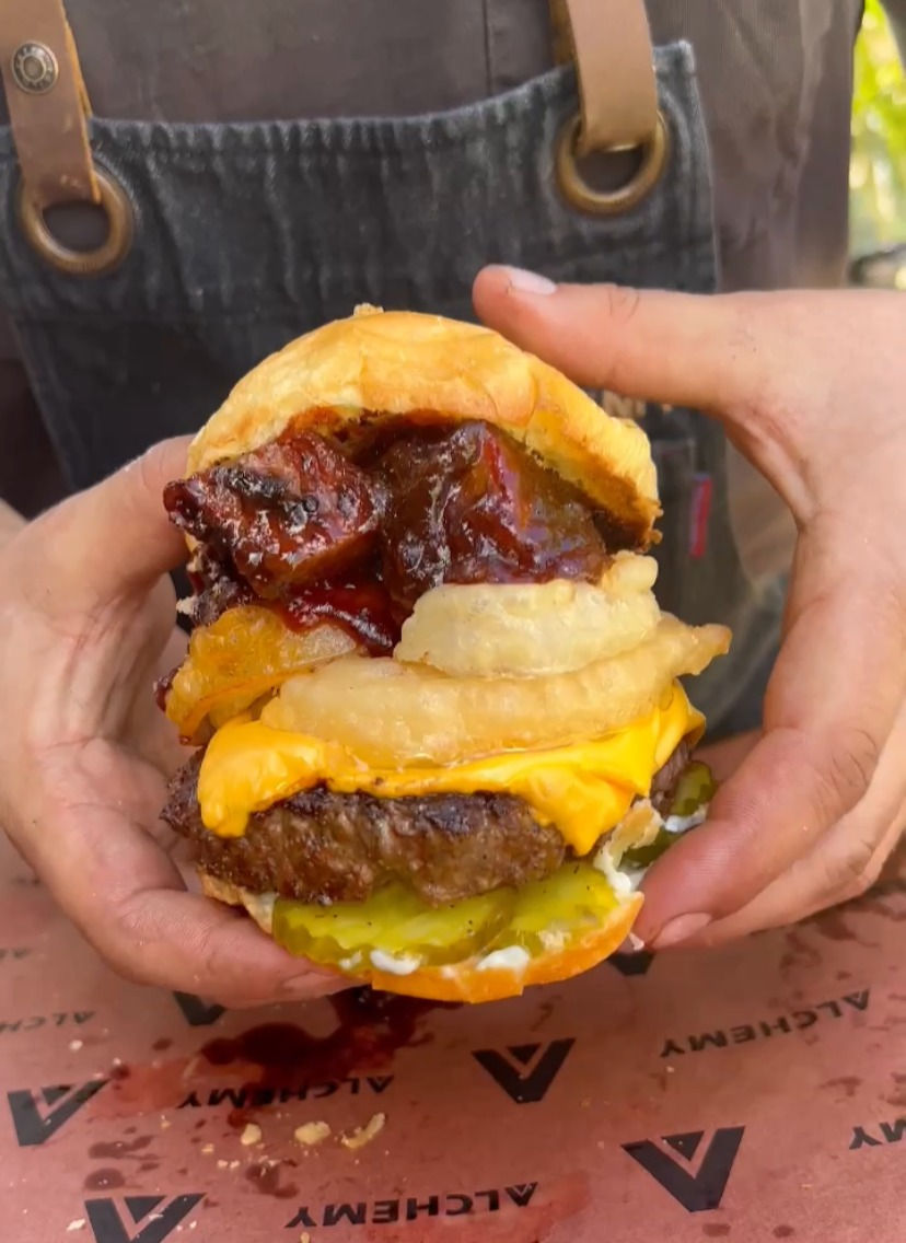 the finished burnt ends cheeseburger, with pickles. garlic mayo, onion rings and bbq brisket burnt ends