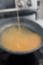 the thickened finished gravy in a pan