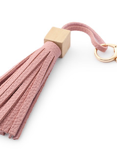 One pink leather keychain isolated on white.jpg