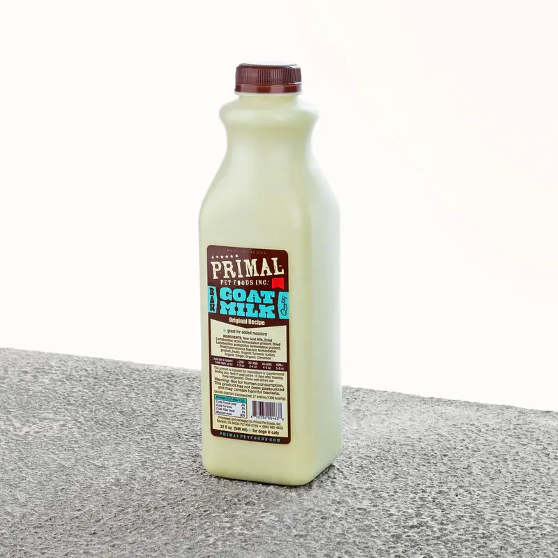 Primal Raw Goat's Milk bottle with nutritious, all-natural supplement for pets.