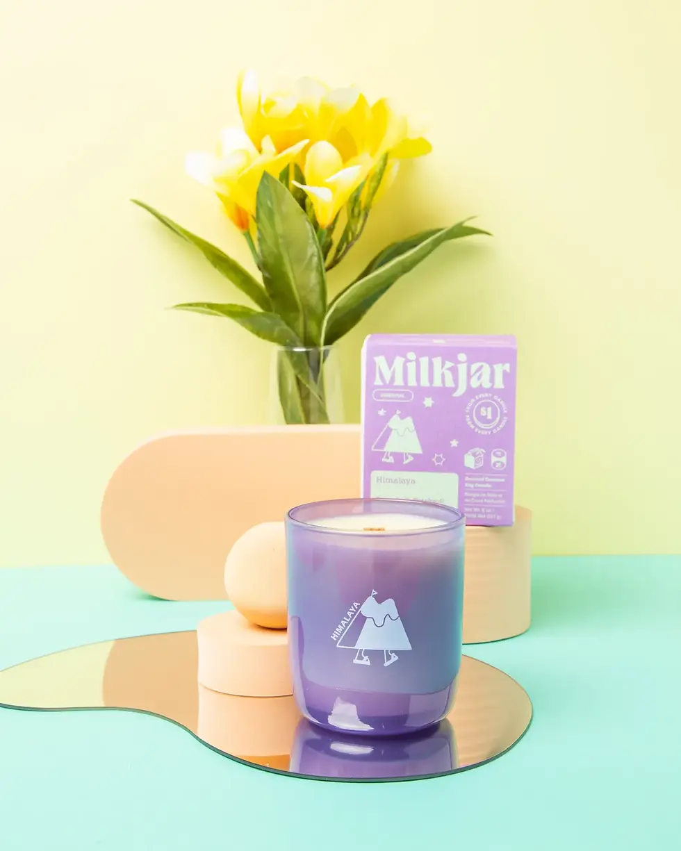 Thumbnail: Milk Jar Co.'s Himalaya Candle - A glass jar candle featuring a purple label