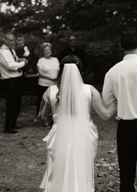 wedding couple and family during the ceremony