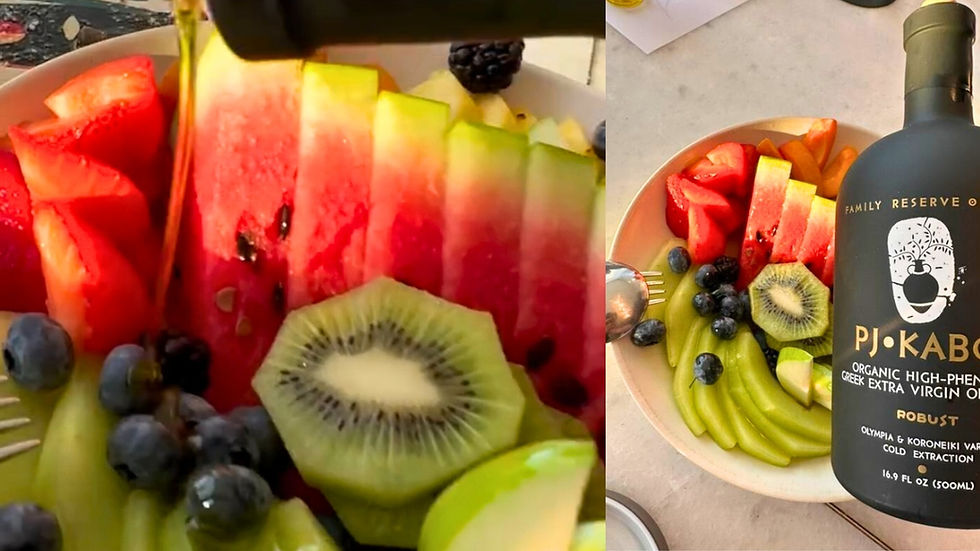 PJ Kabos Family Reserve Organic Robust black bottle with fresh fruit plate of kiwi, berries, apricots, pineapple, apple, and watermelon.