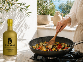 Sauteing a pan of vegetables with PJ Kabos high phenolic olive oil in a Mediterranean kitchen.