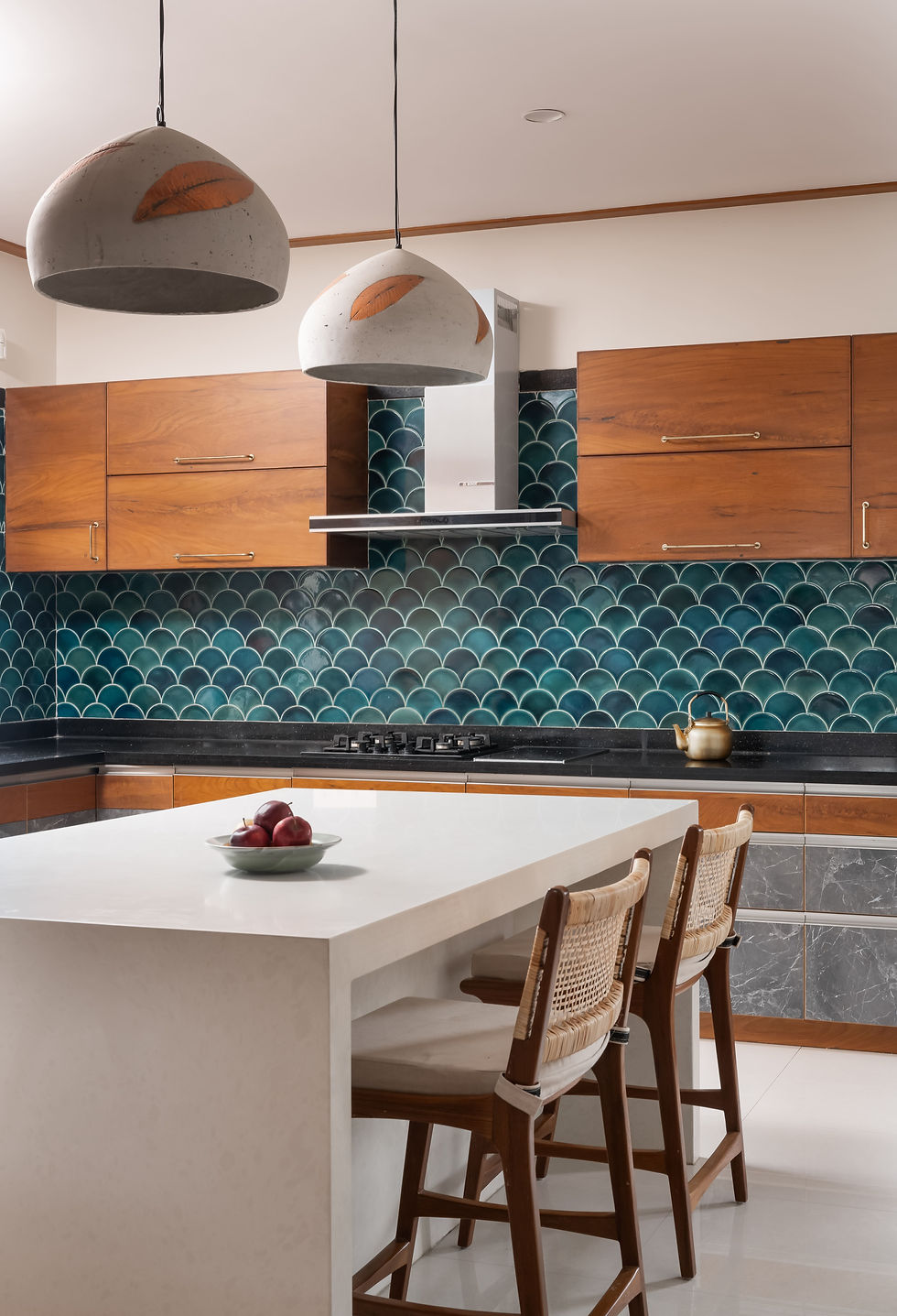 08_Kitchen.jpgopen kitchen with deep teal fish-scale tiles and island counter
