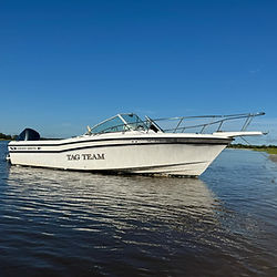 Captain Inman's Tag Team sitting in the sun. Oak Island, Holden Beach, Ocean Isle Beach