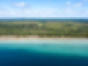 birds_eye_view_of_blue_water_and_lakeshore.jpg