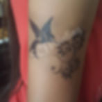 hummingbird/flower Black airbrush tattoo with crisp outline