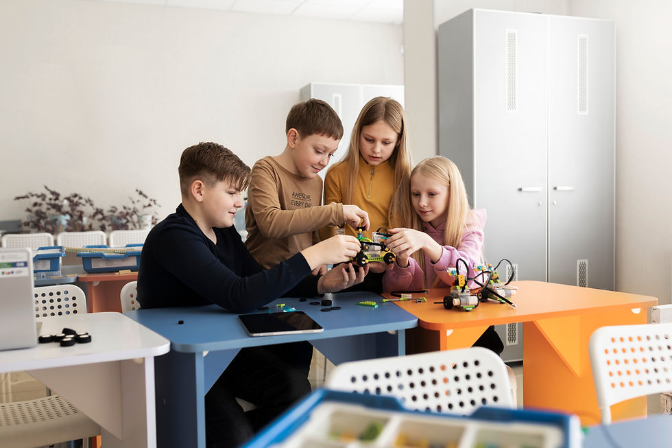 four-kids-building-drone-using-electronic-parts.jpg