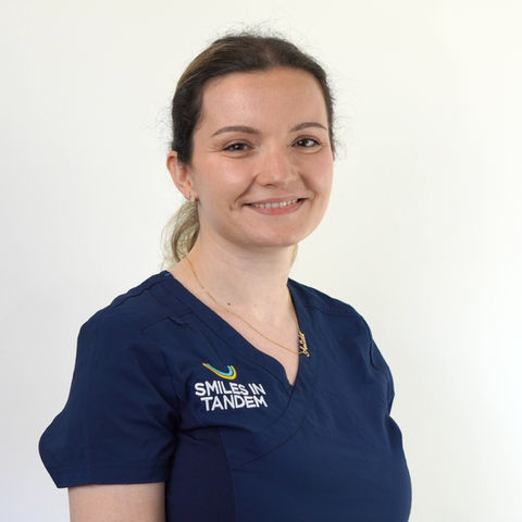 Antida Dental Nurse Smiles in Tandem