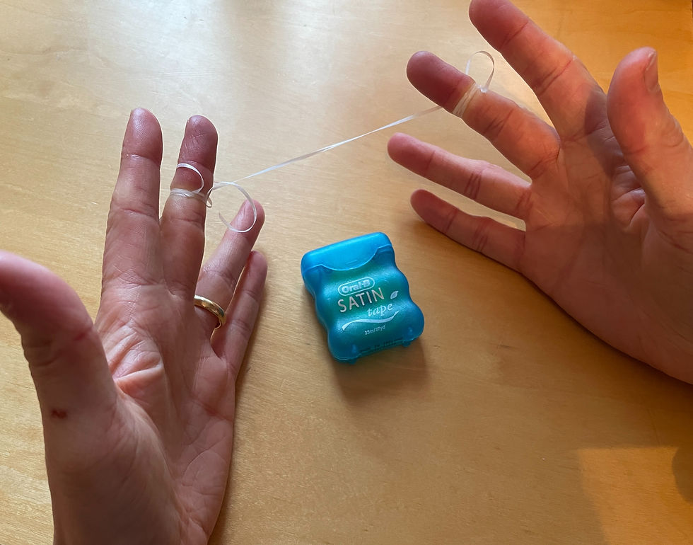 Oral B satin tape dental floss