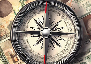 compass over foreign currency.jpg