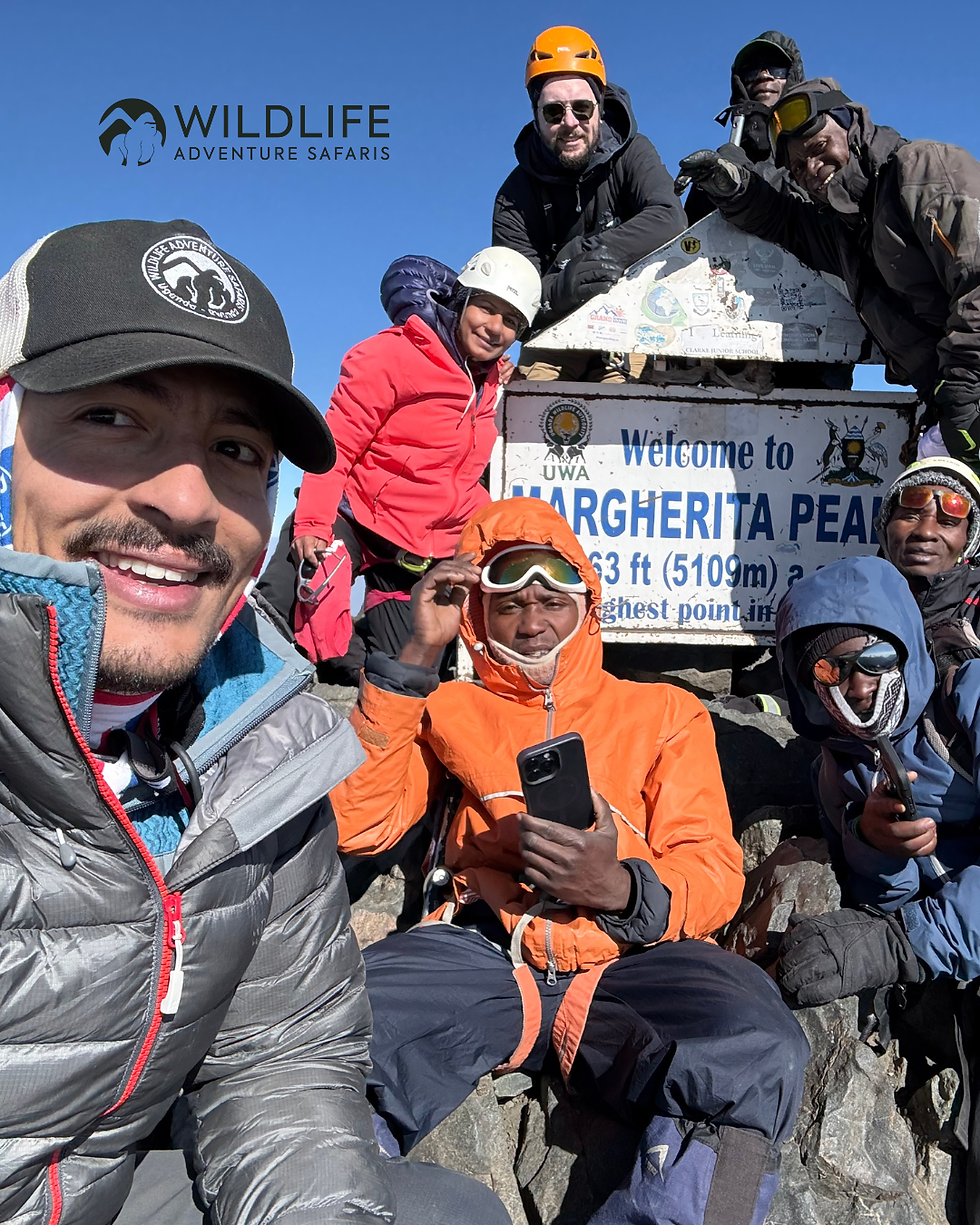 Phil and Peter on the summit of Margherita Peak of Mt Stanley (5,109m) during one of their annual expeditions in the Rwenzori Mountains National Park.