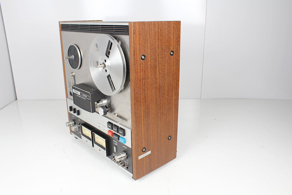 Thumbnail: Side. Vintage Teac 4300, 4 Track Reel to Reel. Available at Electric City Repair Denver Colorado