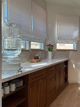 Modern, open-concept kitchen renovation with sleek countertops and custom cabinetry