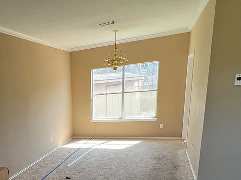 Cozy living room transformation with custom built-ins and stylish lighting