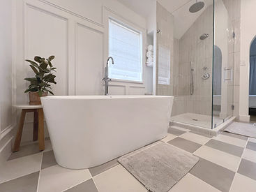 Luxurious bathroom remodel featuring a spa-style shower and elegant fixtures