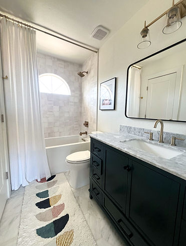Luxurious bathroom remodel featuring a spa-style shower and elegant fixtures