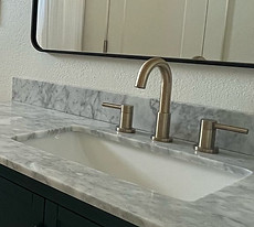 Luxurious bathroom remodel featuring a spa-style shower and elegant fixtures