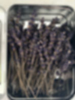 Dried culinary lavender garnish picks in metal tin.