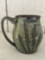 Back view of handcrafted stoneware lavender mug.