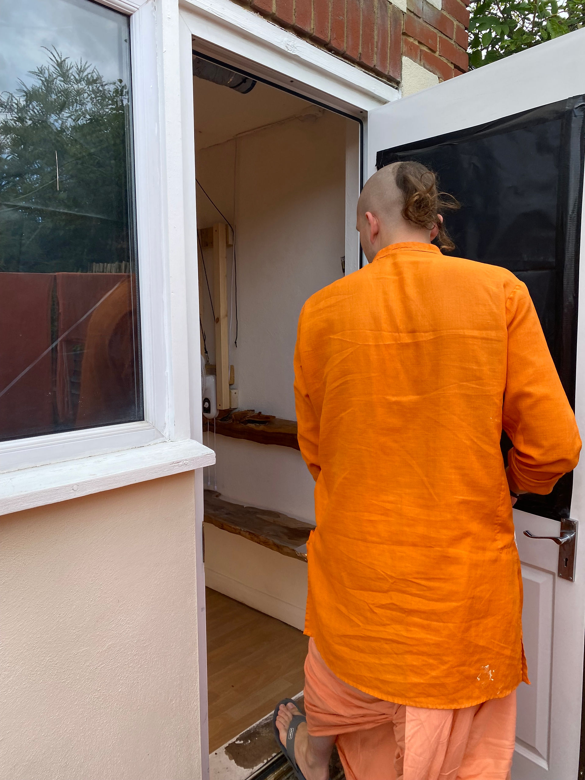 Nityananda Dasa Prabhu and the Tulasi grow room he made