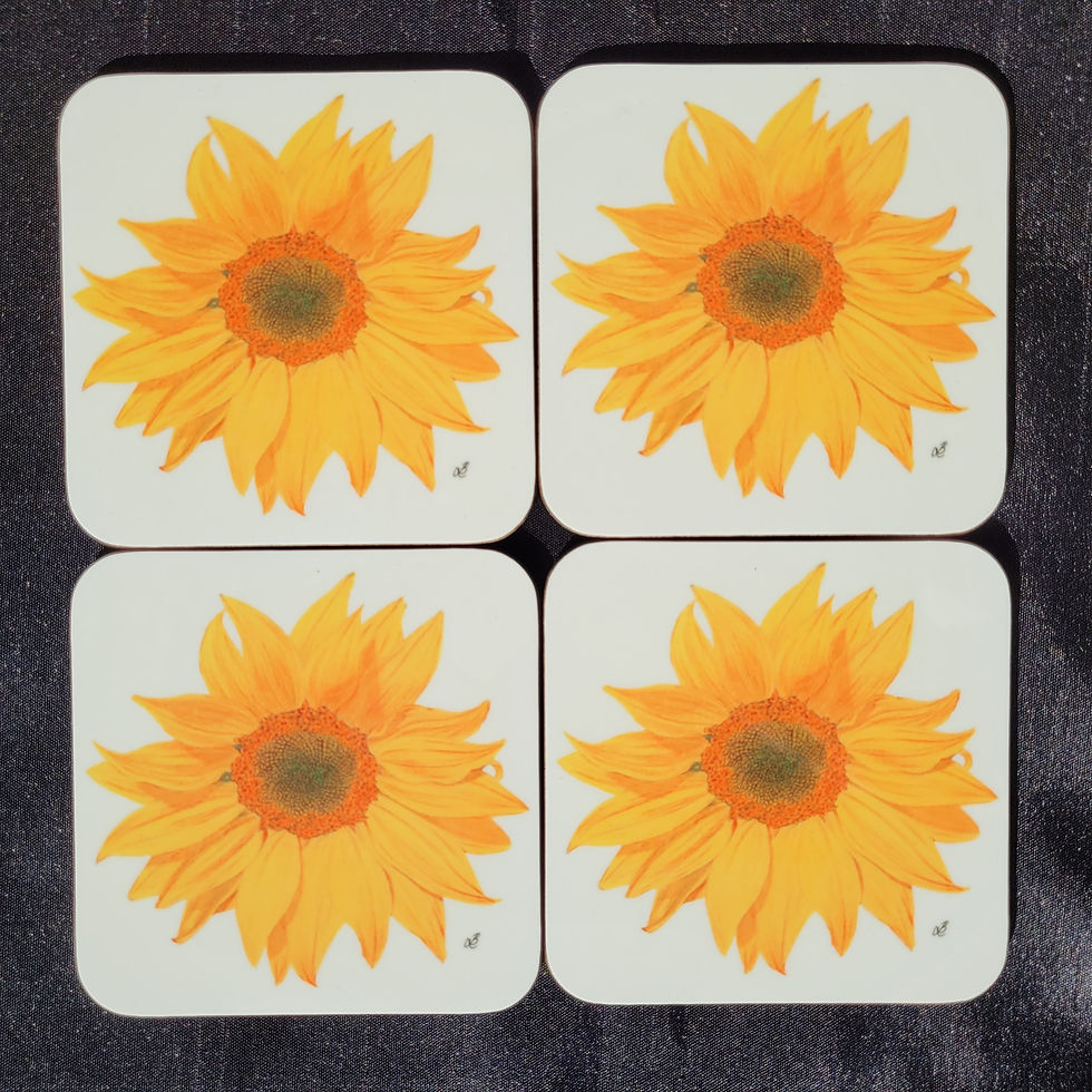 Thumbnail: Flay lay photo of a set of four sunflower coasters. Sunflower design against a white background.