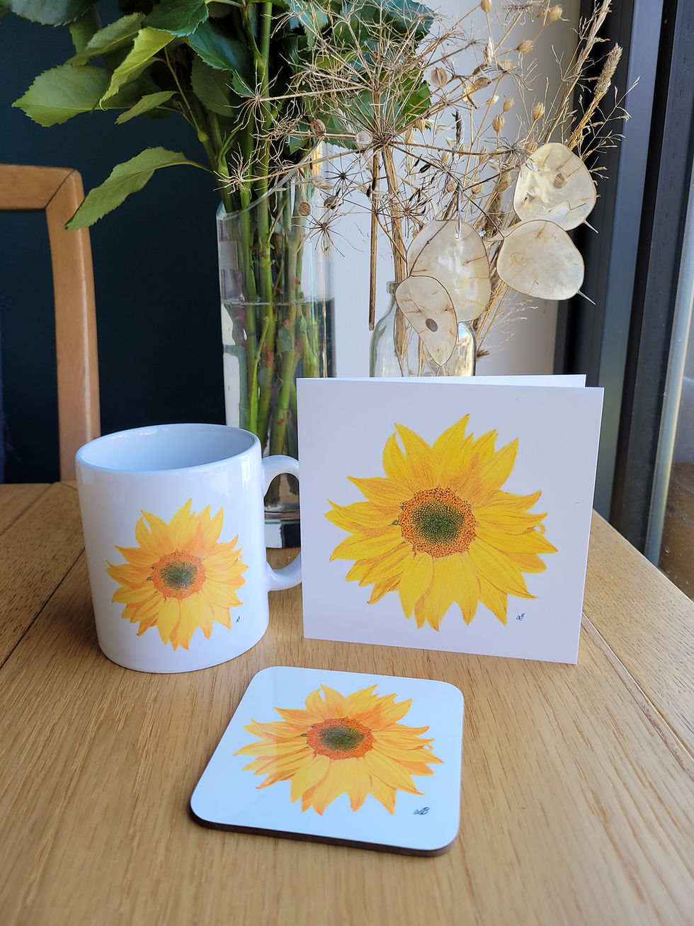 Thumbnail: Sunflower gift set including mug, coaster and greetings card. Sunflower design against a white background.