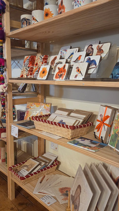 A display of art merchandise by Louise Brook at Forge Coffee, Whittlebury ParkA display of art merchandise by Louise Brook at Forge Coffee, Whittlebury Park. Close up of coasters, cards & prints