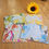 Thumbnail: Angled flay lay of the "Seasons" greeting card collection (4 designs: spring, summer, autumn, winter)