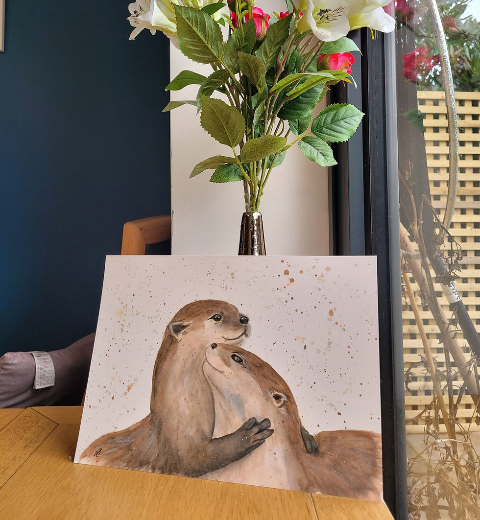 Thumbnail: A4 Limited Edition Print of a watercolour painting "Otterly In Love", featuring two otters hugging, pictured front on