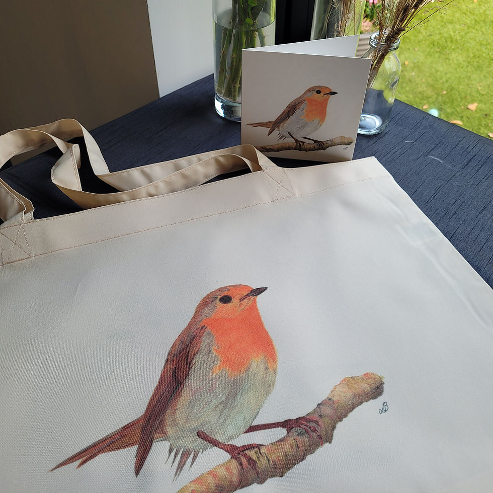 Thumbnail: Close up of design on a large robin tote and card. Robin design against the cream fabric background.