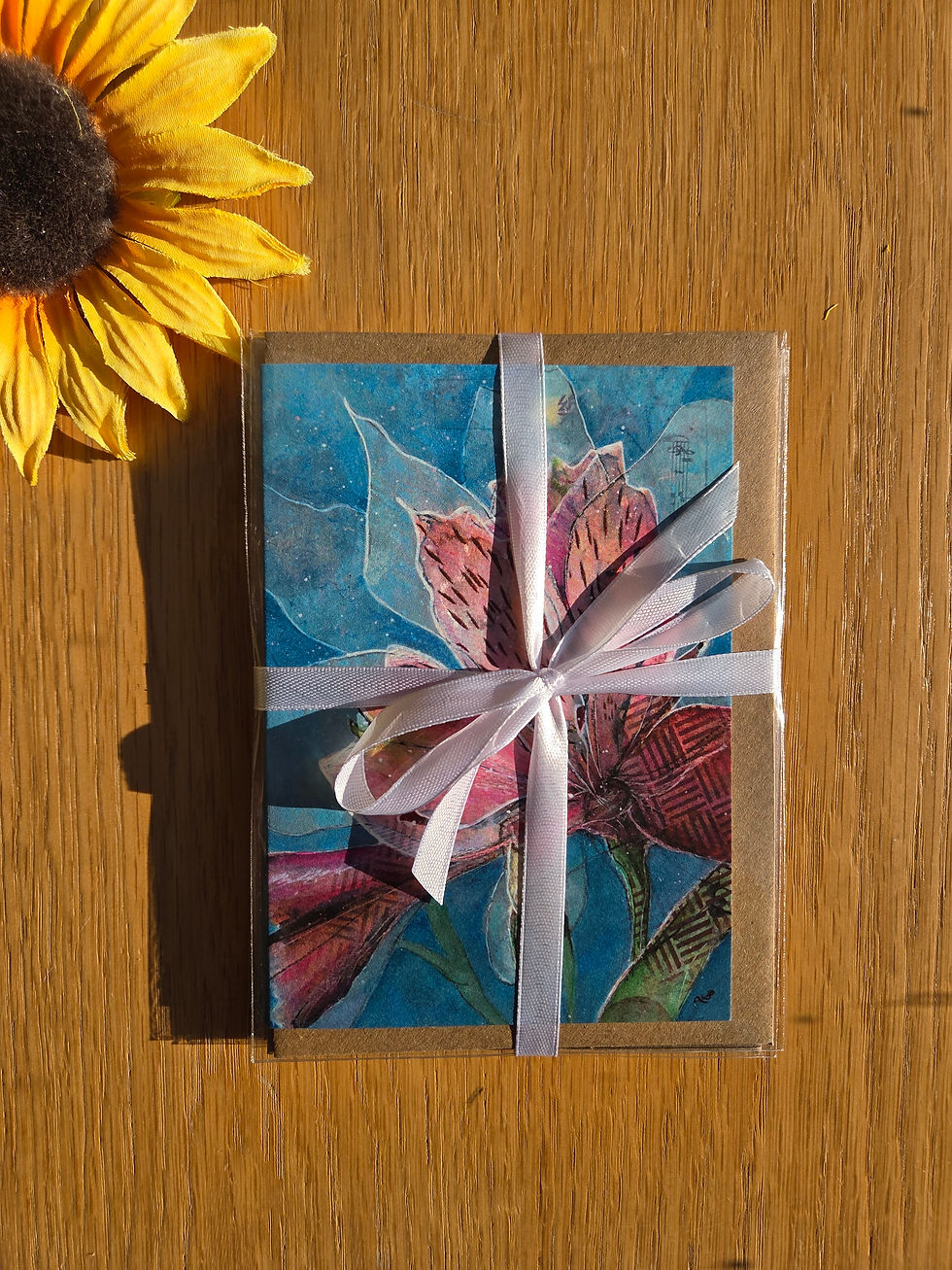The Alstroemeria Greetings Card Collection. Four designs based on the Peruvian Lily, handtied with white ribbon.