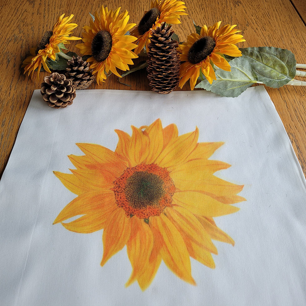 Thumbnail: Close up of a sunflower cushion cover. Sunflower design against the white fabric background.