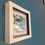Thumbnail: An angle view (from LHS) of Coastal Azure #2, a blue mini abstract by Louise Brook, framed